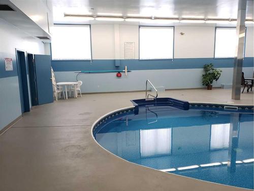 206-75 Temple Boulevard West, Lethbridge, AB - Indoor Photo Showing Other Room With In Ground Pool