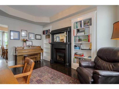 652 11 Street South, Lethbridge, AB - Indoor Photo Showing Living Room With Fireplace