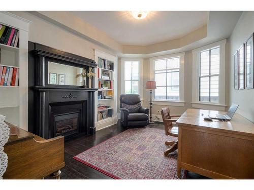 652 11 Street South, Lethbridge, AB - Indoor Photo Showing Other Room With Fireplace