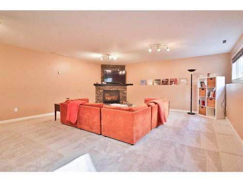 14 Edinburgh Gate West, Lethbridge, AB - Indoor Photo Showing Other Room With Fireplace