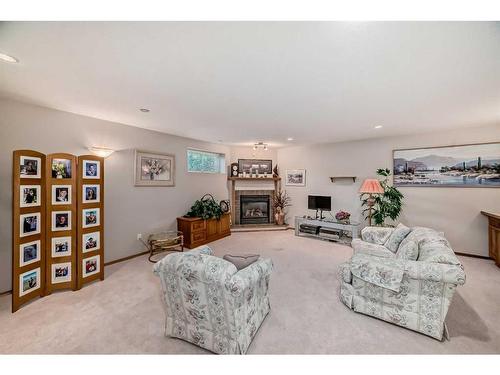 209 Uplands Boulevard North, Lethbridge, AB - Indoor Photo Showing Living Room With Fireplace