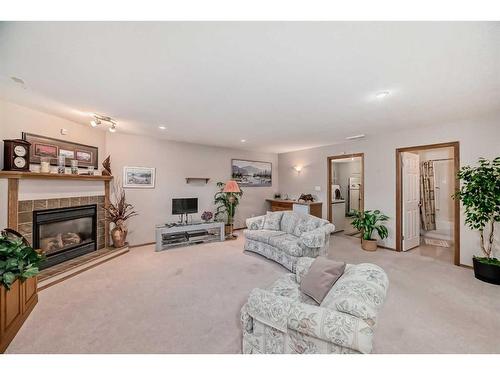 209 Uplands Boulevard North, Lethbridge, AB - Indoor Photo Showing Living Room With Fireplace