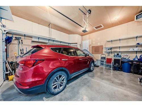 209 Uplands Boulevard North, Lethbridge, AB - Indoor Photo Showing Garage