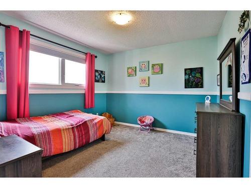 5831 46A Street, Taber, AB - Indoor Photo Showing Bedroom