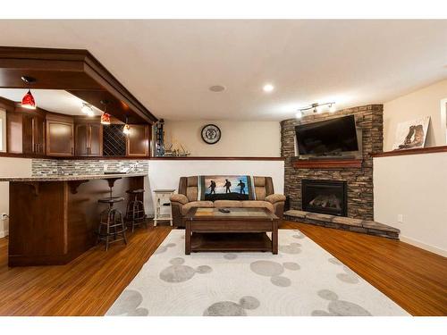 312 Thyrza Burkitt Link North, Lethbridge, AB - Indoor Photo Showing Living Room With Fireplace