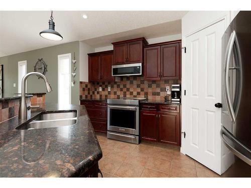 312 Thyrza Burkitt Link North, Lethbridge, AB - Indoor Photo Showing Kitchen With Double Sink