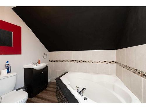 4936 50 Avenue, Stavely, AB - Indoor Photo Showing Bathroom