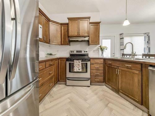 2812 23 Street, Coaldale, AB - Indoor Photo Showing Kitchen With Double Sink