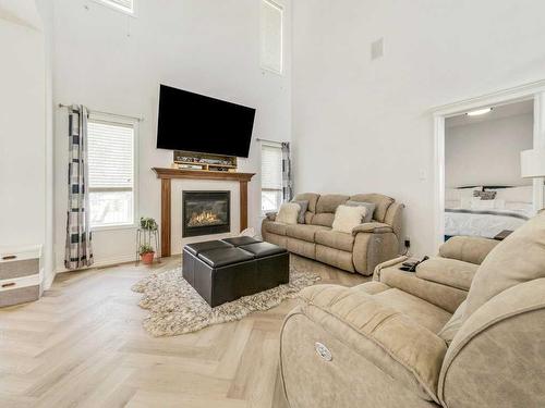 2812 23 Street, Coaldale, AB - Indoor Photo Showing Living Room With Fireplace