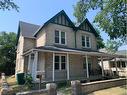 542 12 Street South, Lethbridge, AB  - Outdoor With Deck Patio Veranda With Facade 