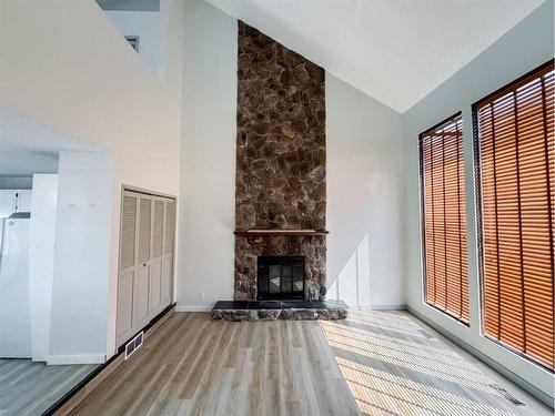 504 Watson Avenue, Picture Butte, AB - Indoor Photo Showing Living Room With Fireplace