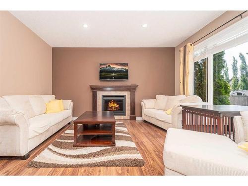 436 Silkstone Crescent West, Lethbridge, AB - Indoor Photo Showing Living Room With Fireplace