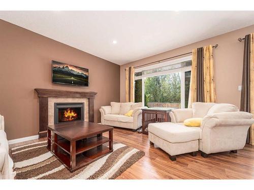 436 Silkstone Crescent West, Lethbridge, AB - Indoor Photo Showing Living Room With Fireplace