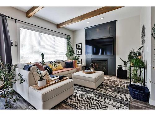 478 Devonia Way West, Lethbridge, AB - Indoor Photo Showing Living Room With Fireplace