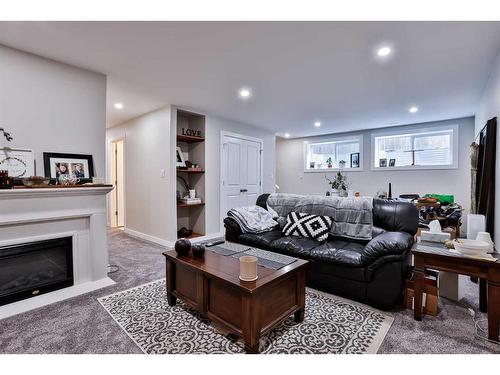 478 Devonia Way West, Lethbridge, AB - Indoor Photo Showing Living Room With Fireplace