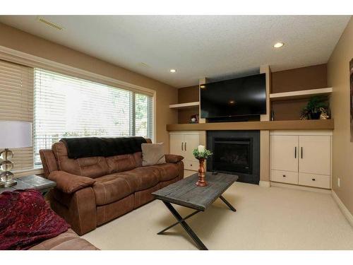 41 Fairmont Terrace South, Lethbridge, AB - Indoor Photo Showing Living Room With Fireplace