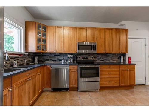 1134 Beverley Mclachlin Drive, Pincher Creek, AB - Indoor Photo Showing Kitchen With Double Sink