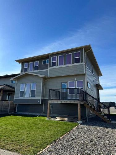 441 Devonia Way West, Lethbridge, AB - Outdoor With Facade