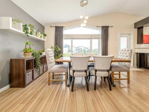 1628 Coalbanks Boulevard West, Lethbridge, AB - Indoor Photo Showing Dining Room With Fireplace