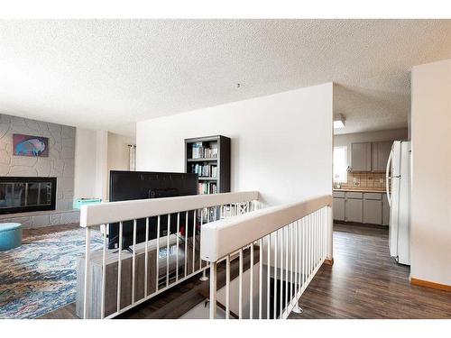 165 Lakhota Crescent West, Lethbridge, AB - Indoor With Fireplace