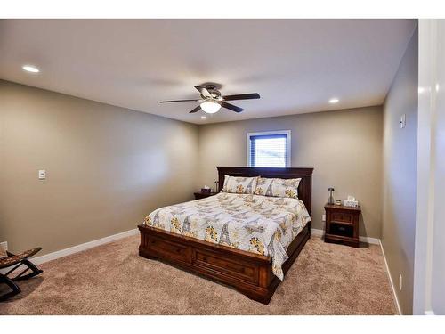 35 Church Avenue, Raymond, AB - Indoor Photo Showing Bedroom