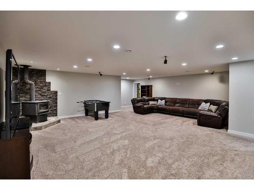 35 Church Avenue, Raymond, AB - Indoor With Fireplace