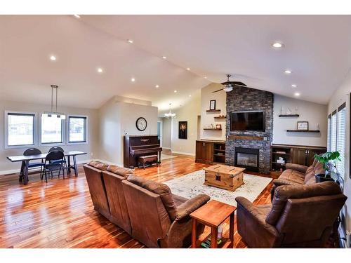 35 Church Avenue, Raymond, AB - Indoor Photo Showing Living Room With Fireplace