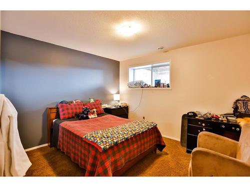 340 W 300 North, Raymond, AB - Indoor Photo Showing Bedroom