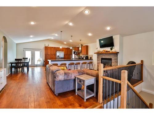 340 W 300 North, Raymond, AB - Indoor Photo Showing Living Room With Fireplace