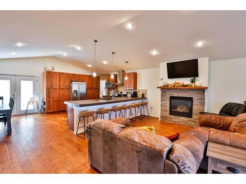 340 W 300 North, Raymond, AB - Indoor Photo Showing Living Room With Fireplace