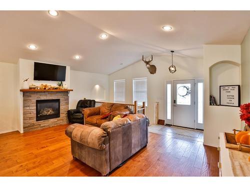 340 W 300 North, Raymond, AB - Indoor Photo Showing Living Room With Fireplace