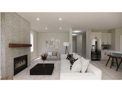 3036 21 Street, Coaldale, AB - Indoor Photo Showing Living Room With Fireplace