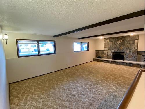 3608-3610 20 Avenue South, Lethbridge, AB - Indoor Photo Showing Other Room With Fireplace