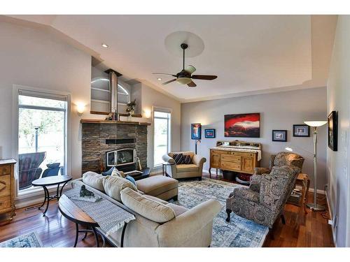 136 Fairway Drive, Coaldale, AB - Indoor Photo Showing Living Room With Fireplace