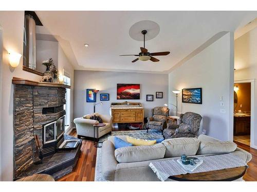 136 Fairway Drive, Coaldale, AB - Indoor Photo Showing Living Room With Fireplace