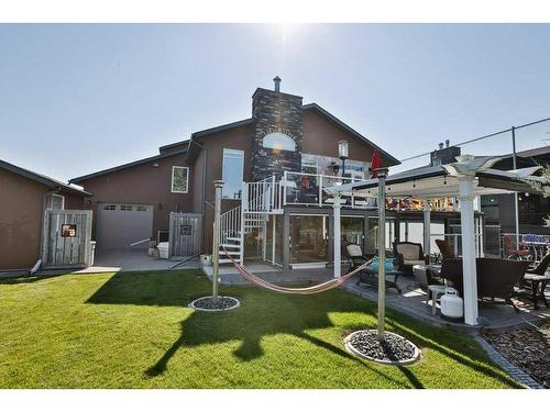 136 Fairway Drive, Coaldale, AB - Outdoor With Deck Patio Veranda