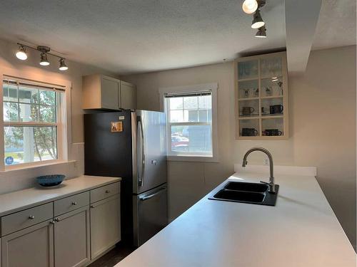 1276 Thistle Crescent, Pincher Creek, AB - Indoor Photo Showing Kitchen With Double Sink