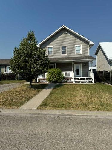 1276 Thistle Crescent, Pincher Creek, AB - Outdoor With Deck Patio Veranda With Facade