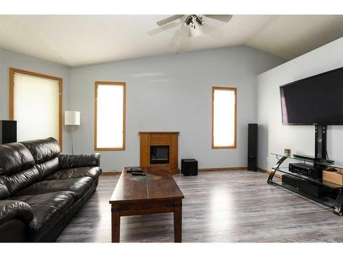 6002 Park Place, Taber, AB - Indoor Photo Showing Living Room With Fireplace