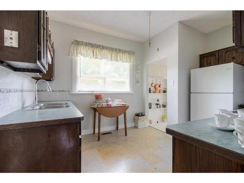 602 12C Street North, Lethbridge, AB - Indoor Photo Showing Kitchen With Double Sink