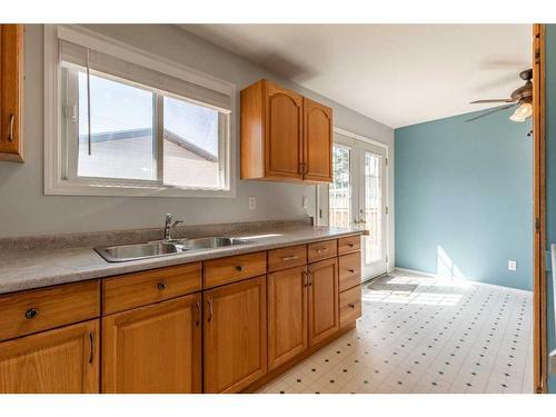 2614 21 Avenue South, Lethbridge, AB - Indoor Photo Showing Kitchen With Double Sink