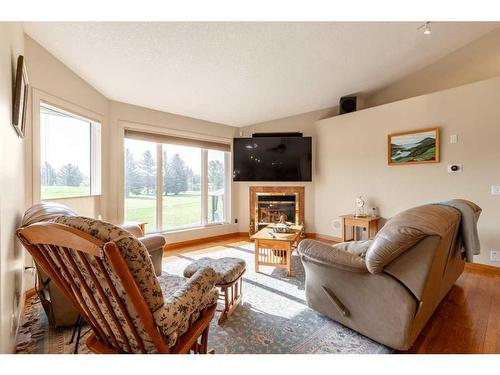 82 St James Crescent North, Lethbridge, AB - Indoor Photo Showing Living Room With Fireplace