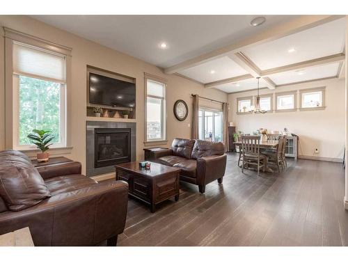 327 Prairie Garden Way South, Lethbridge, AB - Indoor Photo Showing Living Room With Fireplace