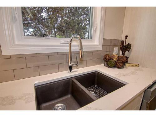 1805 17A Street South, Lethbridge, AB - Indoor Photo Showing Kitchen With Double Sink