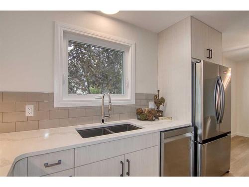 1805 17A Street South, Lethbridge, AB - Indoor Photo Showing Kitchen With Double Sink