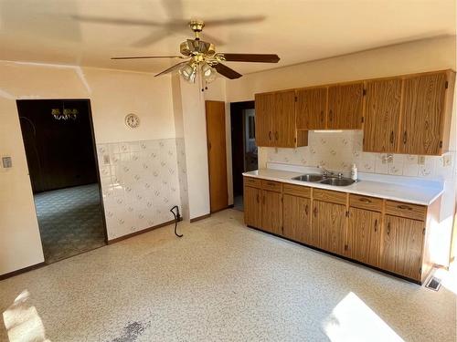 1919 7 Avenue North, Lethbridge, AB - Indoor Photo Showing Kitchen With Double Sink