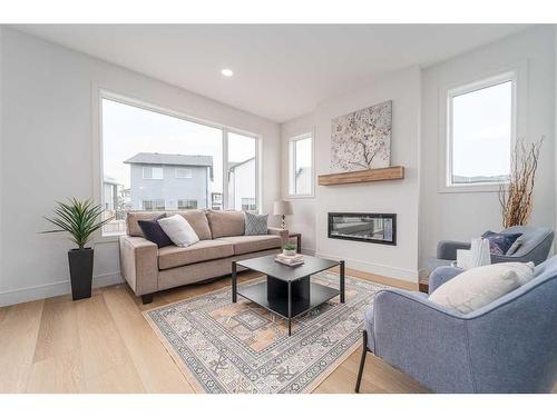 53 Goldenrod Place West, Lethbridge, AB - Indoor Photo Showing Living Room With Fireplace