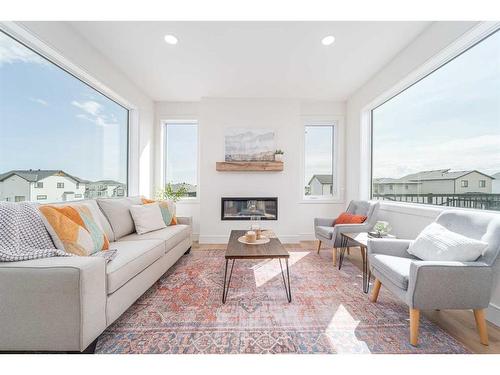 745 Violet Place West, Lethbridge, AB - Indoor Photo Showing Living Room With Fireplace