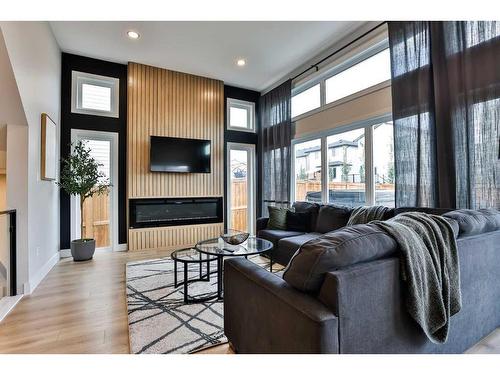 1477 Coalbanks Boulevard West, Lethbridge, AB - Indoor Photo Showing Living Room With Fireplace