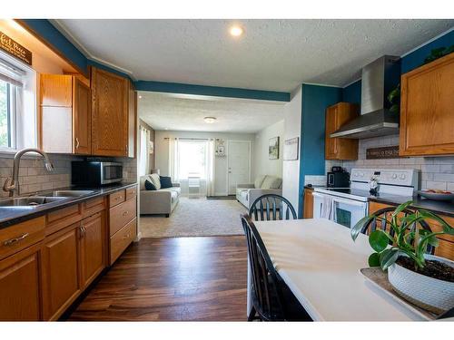 5214 43 Avenue, Taber, AB - Indoor Photo Showing Kitchen With Double Sink